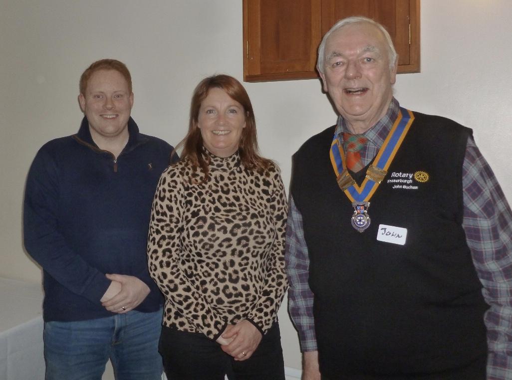 President John Buchan welcomes Two new members of Rotary Club of Fraserburgh 