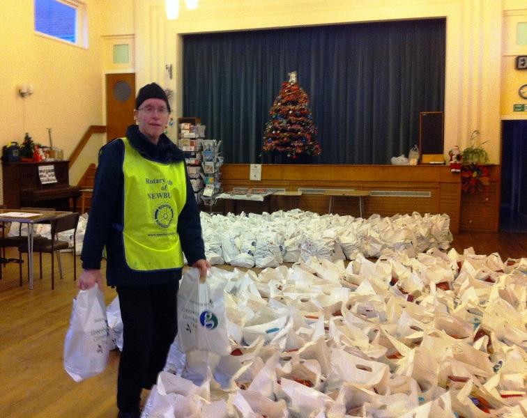 Newbury Weekly News Over 80's Parcel Distribution - Rotarian Eddie Webb in a sea of  NWN Over 80's Xmas parcels