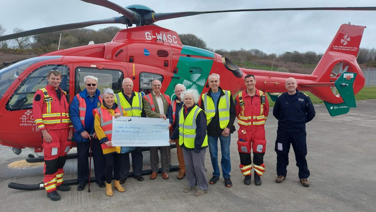 Presentation of Cheque at Llanelli Wales Air Ambulance Trust Operational Base by members of Clwb Rotari Aberaeron Rotary Club A’r Cylch