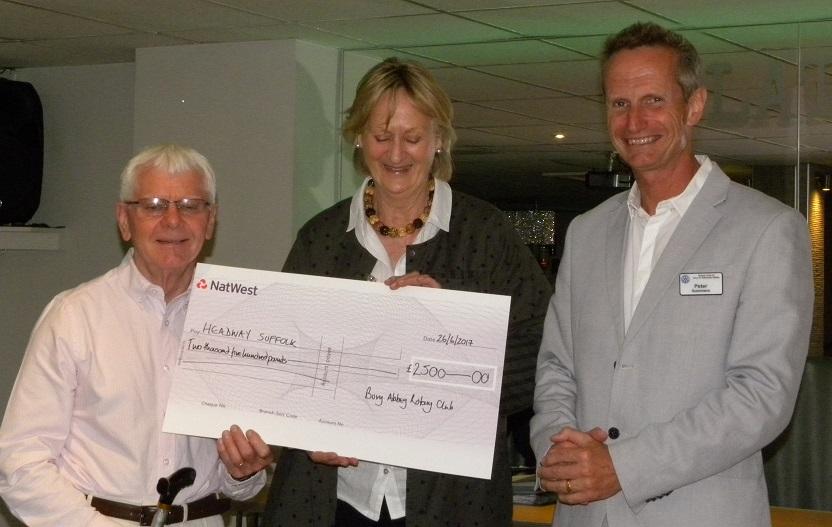 Charity Awards Event 26th June 2017 - Alan Moore and Gayle Fogg-Elliot of Headway Suffolk, receive  a cheque from President Peter Summers