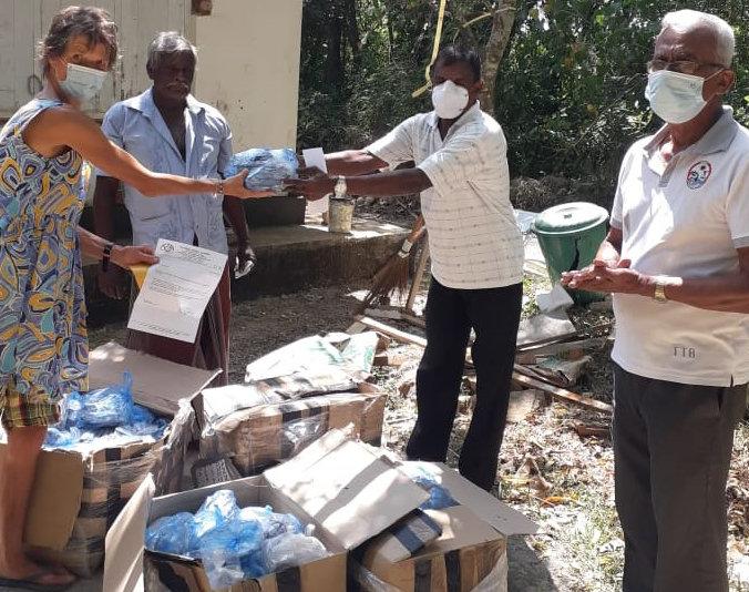 Annie Arkwright hands over another batch of SpecSort glasses to the Navajeevana Centre, Sri Lanka.