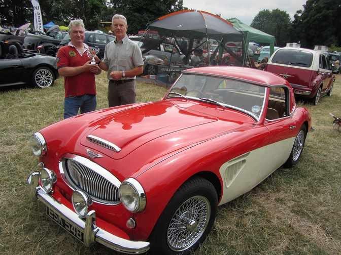 Best car at Ashover: Well done John Gregory of Kilburn, near Derby, awarded 'best car' at the 2018 Ashover Classic Car & Bike Show with his 1962 Austin Healey 3000.  Trophy presented by Chesterfield Scarsdale Rotary president Ron Enock.