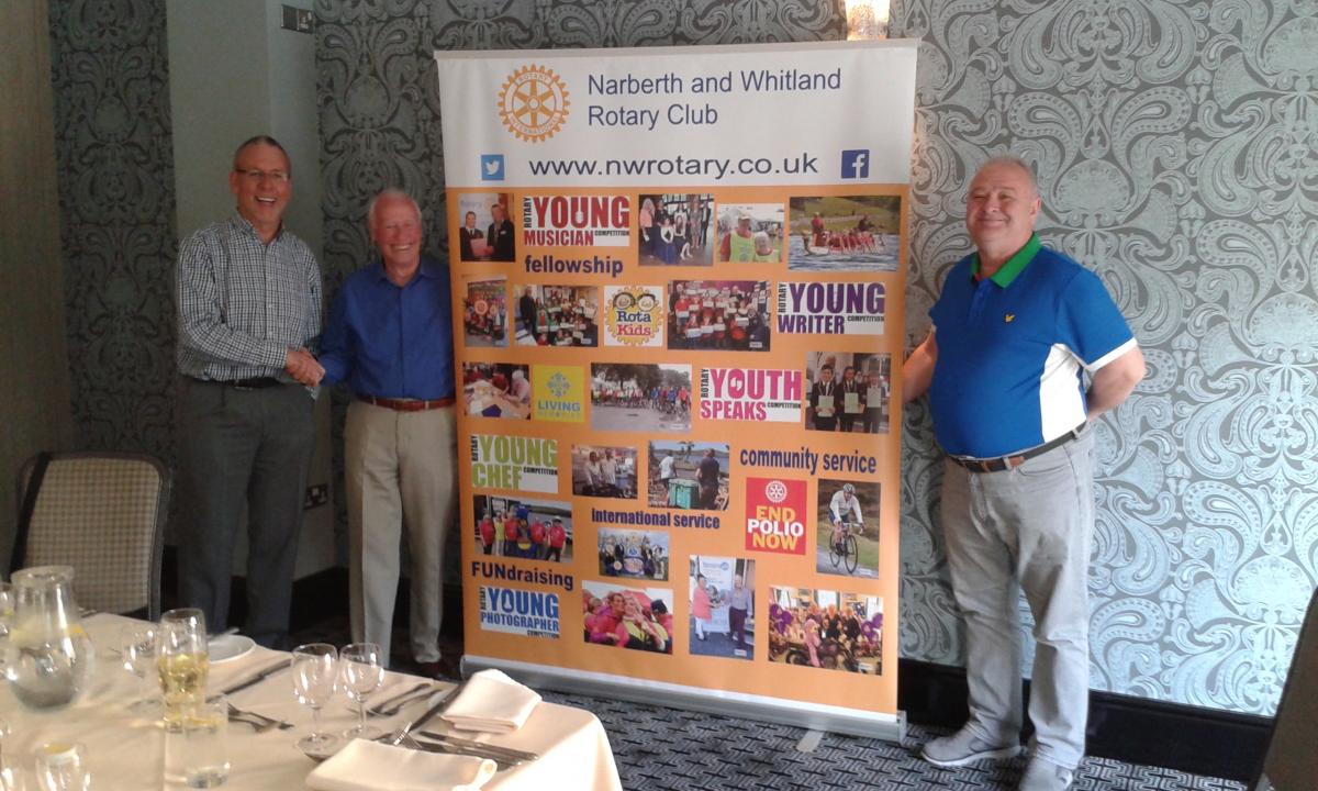 Rotarian Ken Morgan is pictured (left) next to Club President Tony Ensom whilst Rotarian John Hughes is on the right.