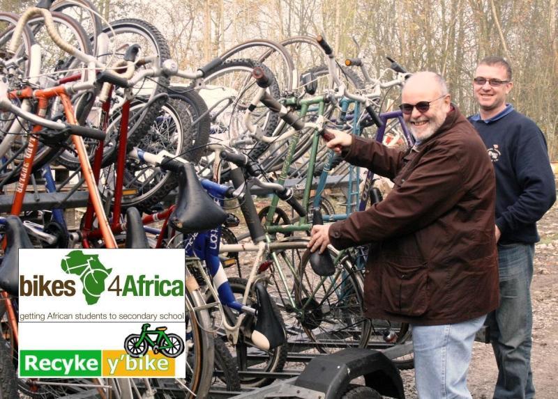 Buxton Rotarian Doug Jones (left), with Lee Charles of Bradwell Packaging, with unwanted Buxton bikes to go to Africa.