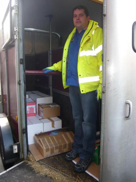 Keiran supervises the loading of 2,000 children's books destined for South Africa.