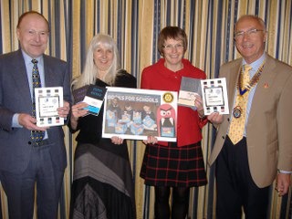 Thomas More and Chapel High school teachers receive books and promote The Times/Sunday Times 'Books For Schools' token scheme.