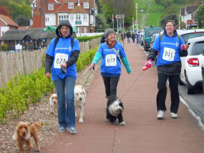 Some happy walkers nearing the end of the walk at Eastbourne, the dogs enjoyed it.