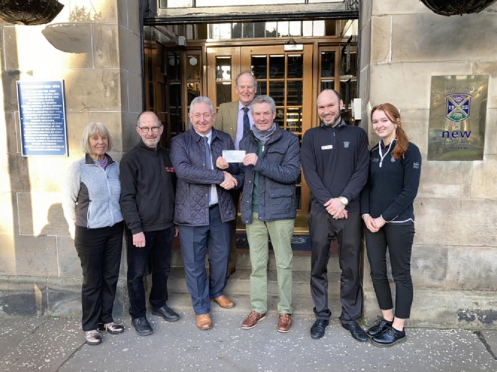 Red Wine cast Brenda Hunter and Alan Tricker, with CHAS rep Bob Moncur receiving the cheque from Resources Convenor Colin Brown. President Elect Frank Quinault and New Club staff Brett Murray and Kerri McLeod completed the team.