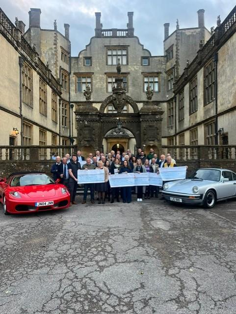 Charity Representatives Receive Their Cheques