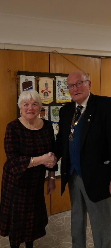 President John Reid greets Janis Buckley from The Cheerful Sparrows charity.
