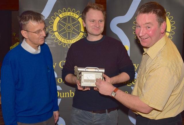 Adam Varley (centre) shows President-Elect George Morrison (right) and Russell Wheater, Speaker