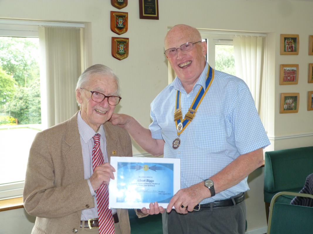 Bert Biggs receiveing his award from President Mike Williams