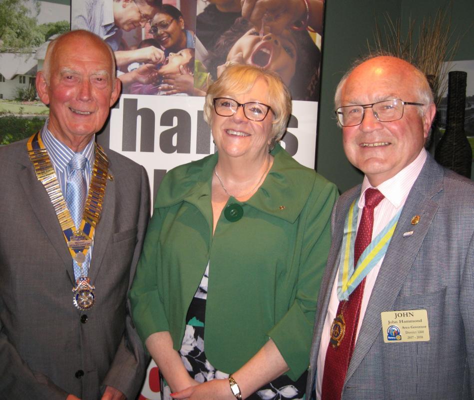 Club President Peter Jackson; Yvonne Sonnen; Asst District Gov John Hammond