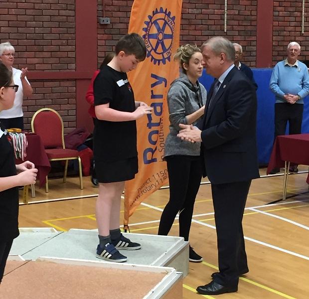 The Welsh Amateur Gymnastics Association Competition  - District Governor Steve Jenkins presents an award
