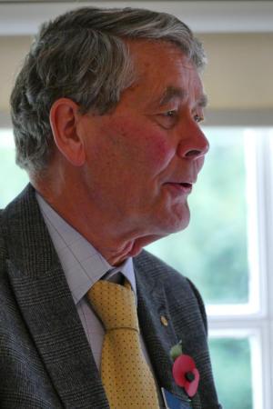 A man wearing a poppy