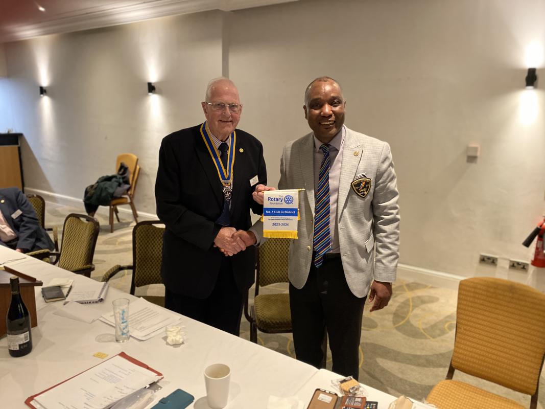 Denzil - on the right - is welcomed by Maurice Holden, the current President of Kenilworth Rotary