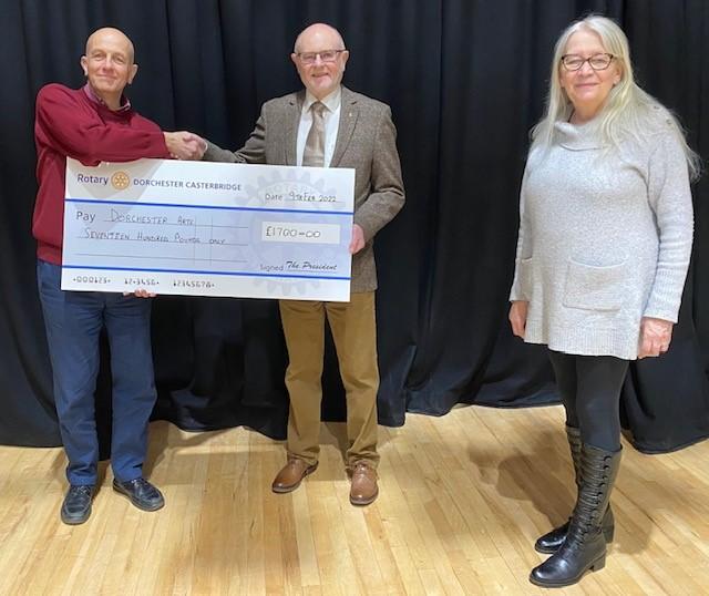 Artistic Director Mark Tattersall receiving the cheque from President Roy and IPP Vanessa Lucas