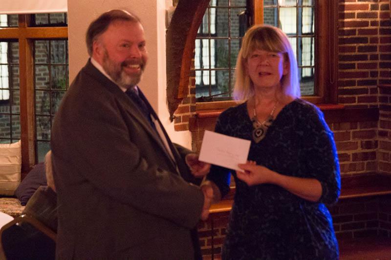 Alison Sweeting receiving the cheque from Immediate Past President, Andy Ballard