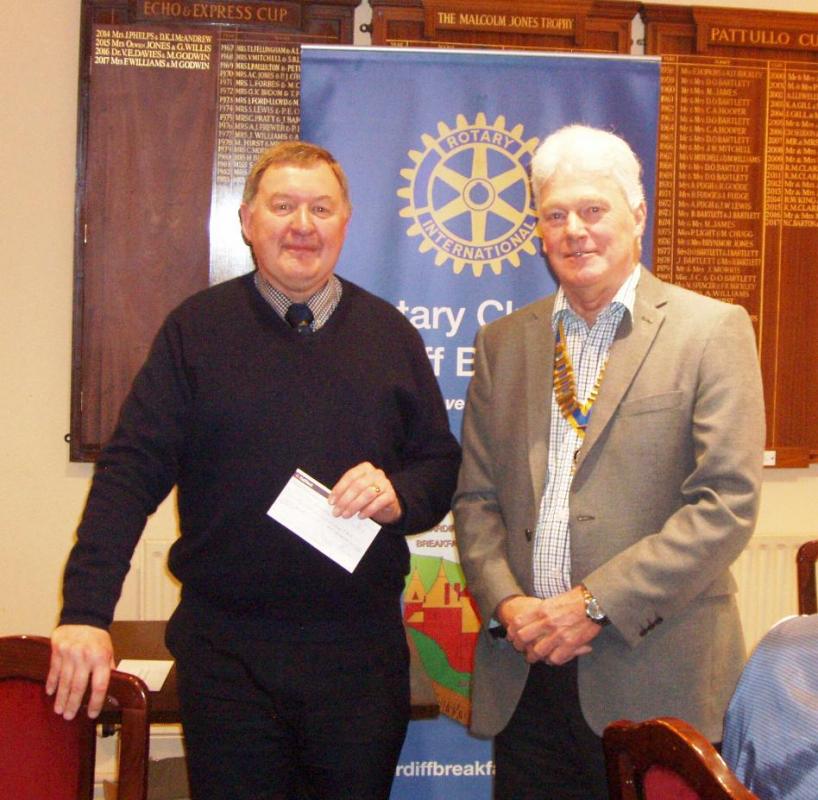 President Steve presents Eric Phillips with the cheque for the Youth Orchestra