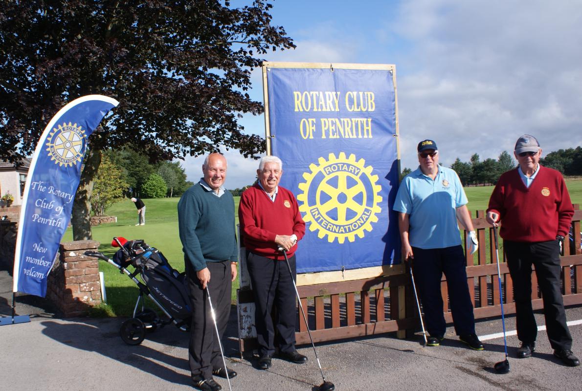 After yesterday's deluge and course closure, all is well for the annual fund raising golf event. Here, Rotary team David Harle, Malcolm Boyd Nick Capron and Alex Buchan pause on their way to the first tee. As it says on the flag New Members are Welco