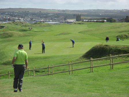 Charity Golf Day at West Cornwall GC - George calmly walks down after a brilliant drive past the Truro team on the 15th Green
