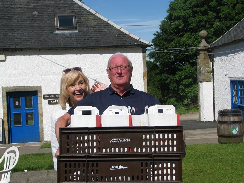 President Anne and Past President Kenny deliver lunch for the hungry pupils.  