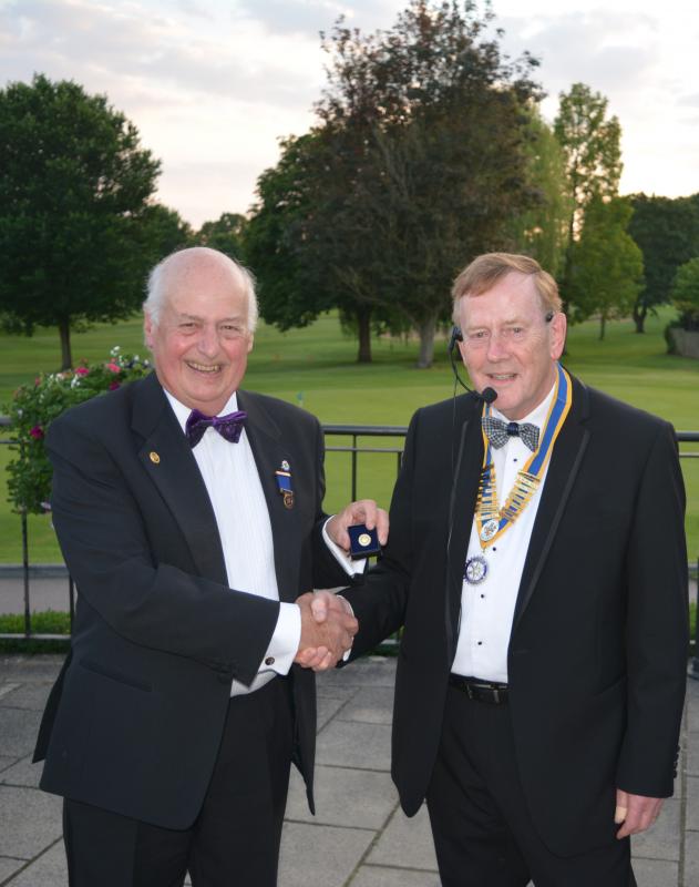 Rotarian Rob receiving his PHF Sapphire at the Presidents Handover Meeting
