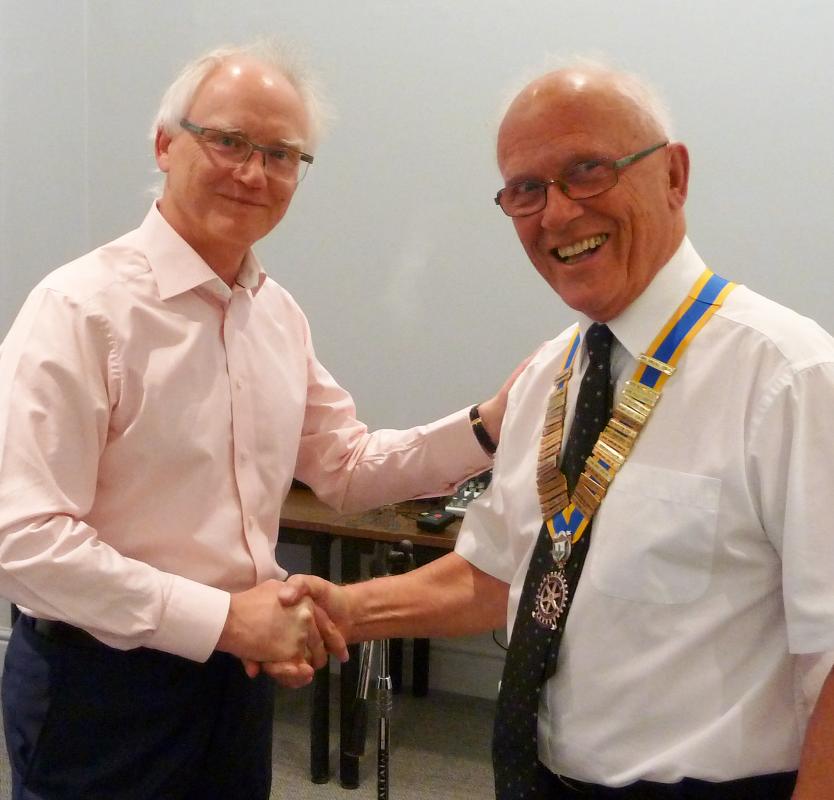 Past President Adrian passes on the Presidents Jewel to 
Incoming President Mike Till
