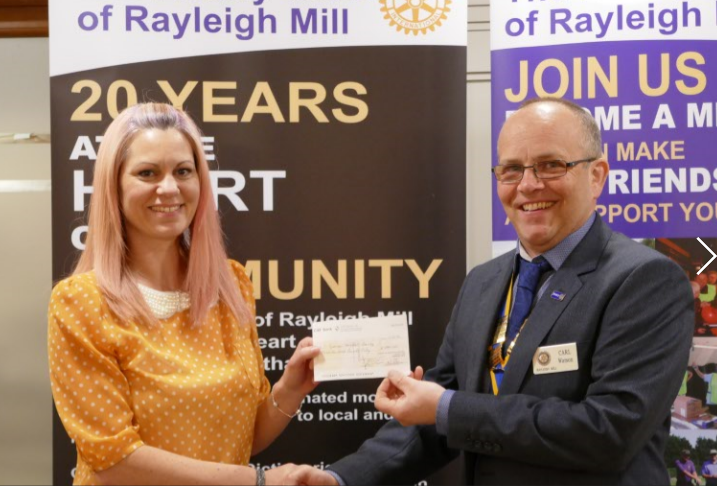 Rotary Club of Rayleigh Mill President Carl Watson presents Hannah with a cheque for £500 to add to the sum donated by many other of Hannah’s sponsors