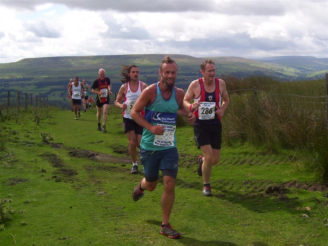Runners reach Gate1 at the top of Black Hill