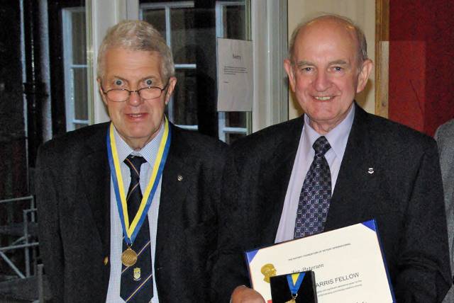 Harry Fisher presents Jim Paterson with the Paul Harris Fellowship