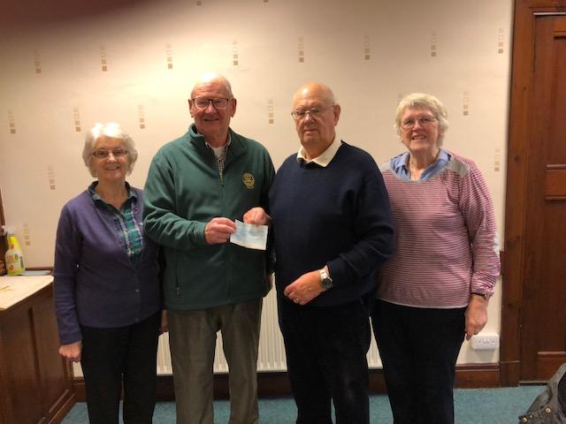 President Scott hands over cheque to Ron Laidlaw who is accompanied by BTN's Jane Bannerman and Dorothy Shaw