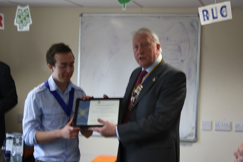 President David Grey, Rotary Club of Durham presents the RI Charter to President Grant Hollis, founding President of Durham Sixth Form Interact Club