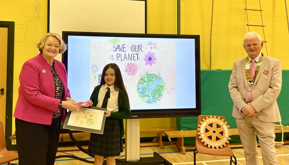Gracie is congratulated by Dr Phillipa Whitford MP at her school assembly - St Patrick's Primary, Troon.  