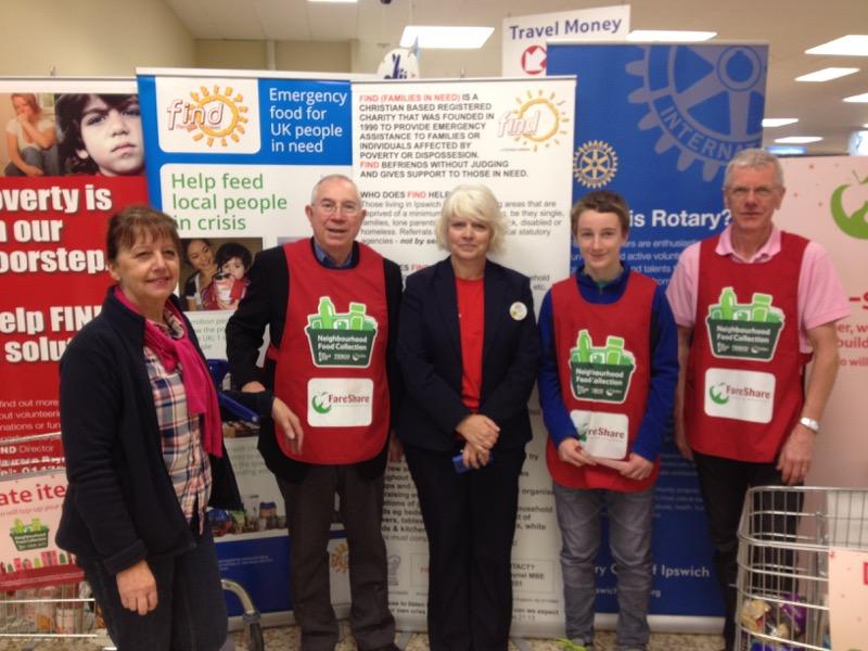 Maureen Reynel from FIND with Mandy Lloyd from Tesco and Rotary Supporters.