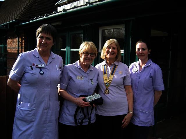 Annette Jackson, President Rotary Club of Southam 2000 with the Hospice at Home nurses, displaying the new Syringe Drive