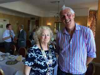 The picture shown Andrew with President Diana Loveland .