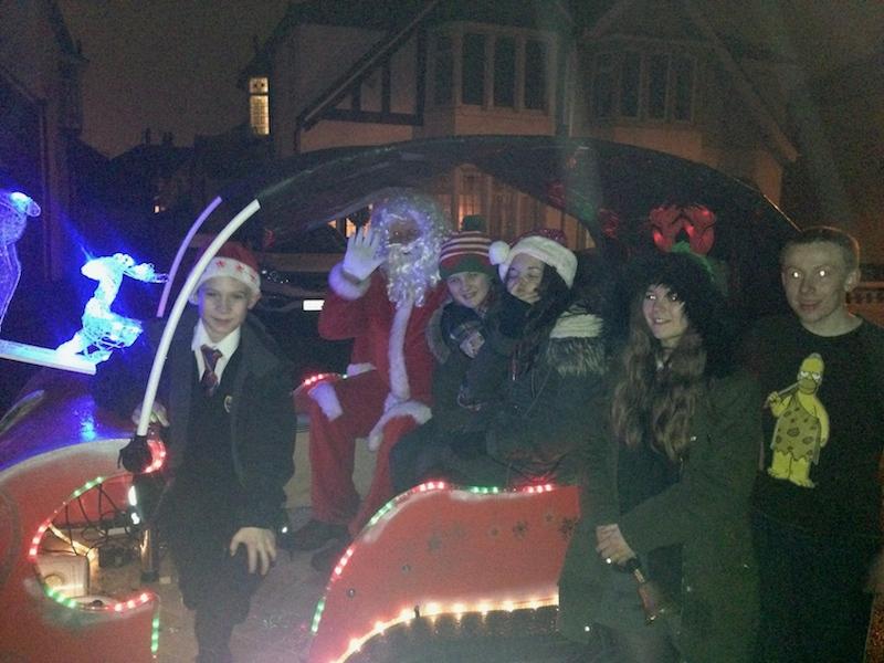 Members of Cardinal Allen High School helping on Thornton Santa Collection December 2015