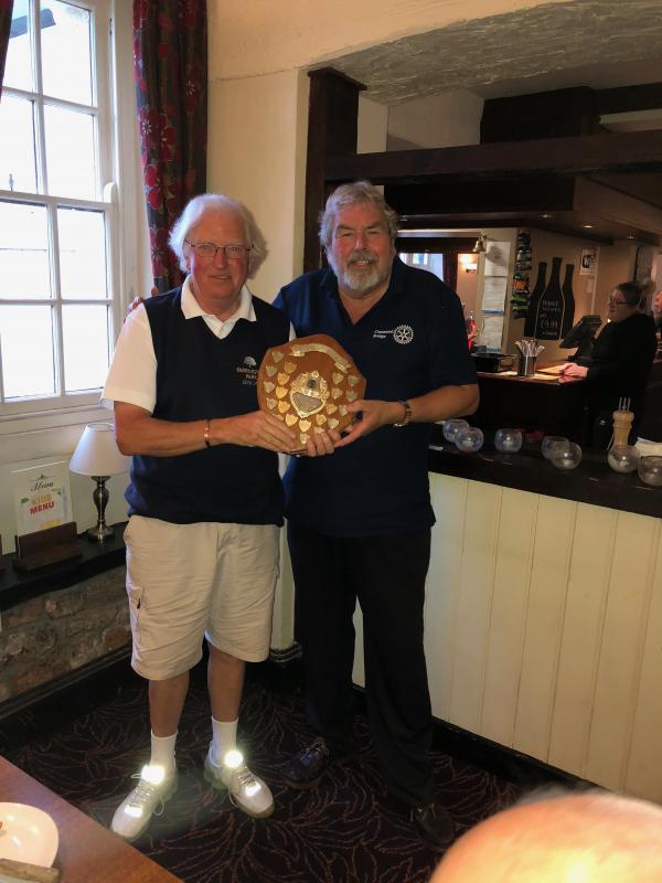 Winner this year Mike Hedges, presented with the Shield by last years winner Doug Nash