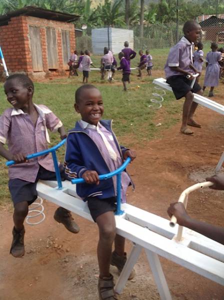 Children having a ball on Rotary funded play equipment. 