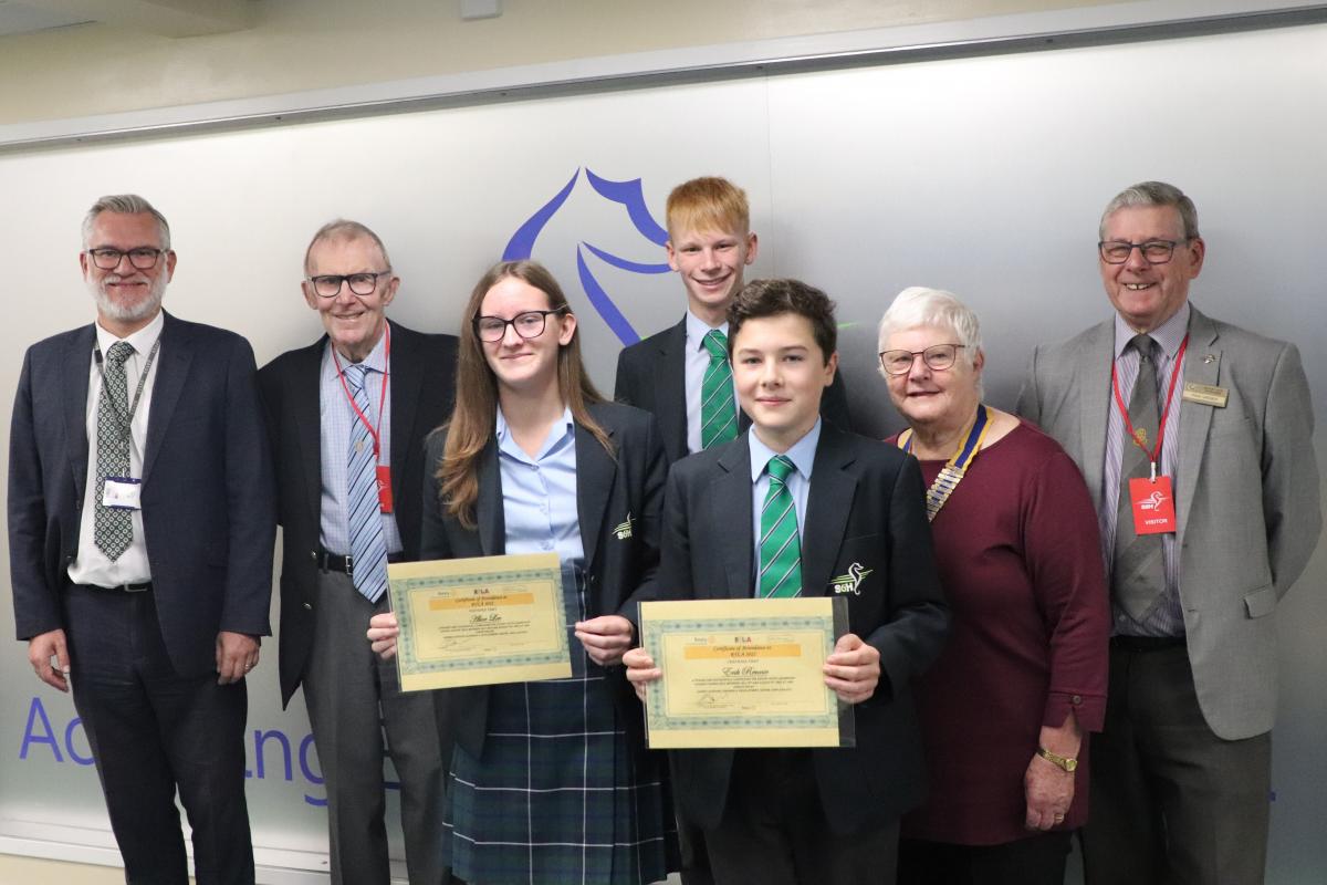 From the left: Head Teacher Bob Ellis, Rotarian Peter Postgate, Alice Lee, Joseph Lacy, Erik Rennie, President Ann Reed, and Youth Services Chair Paul Vaesen