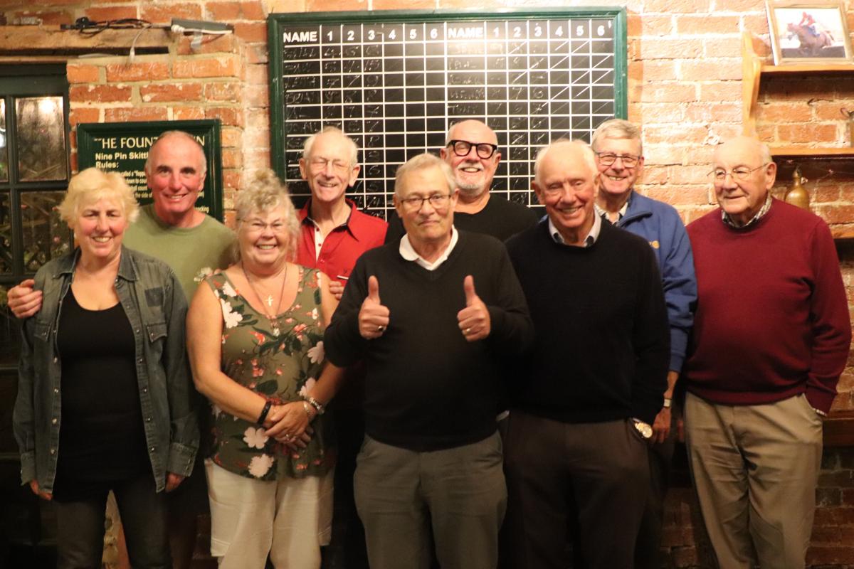 Seaford B skittles team. From the left: Val Percival, Brian Percival, Lizzie Holt, Ken Holt, Bill Pierce, John Windsor, Frank Thompson, Paul Vaesen, and John Lockyer plus Keith Ross behind the camera