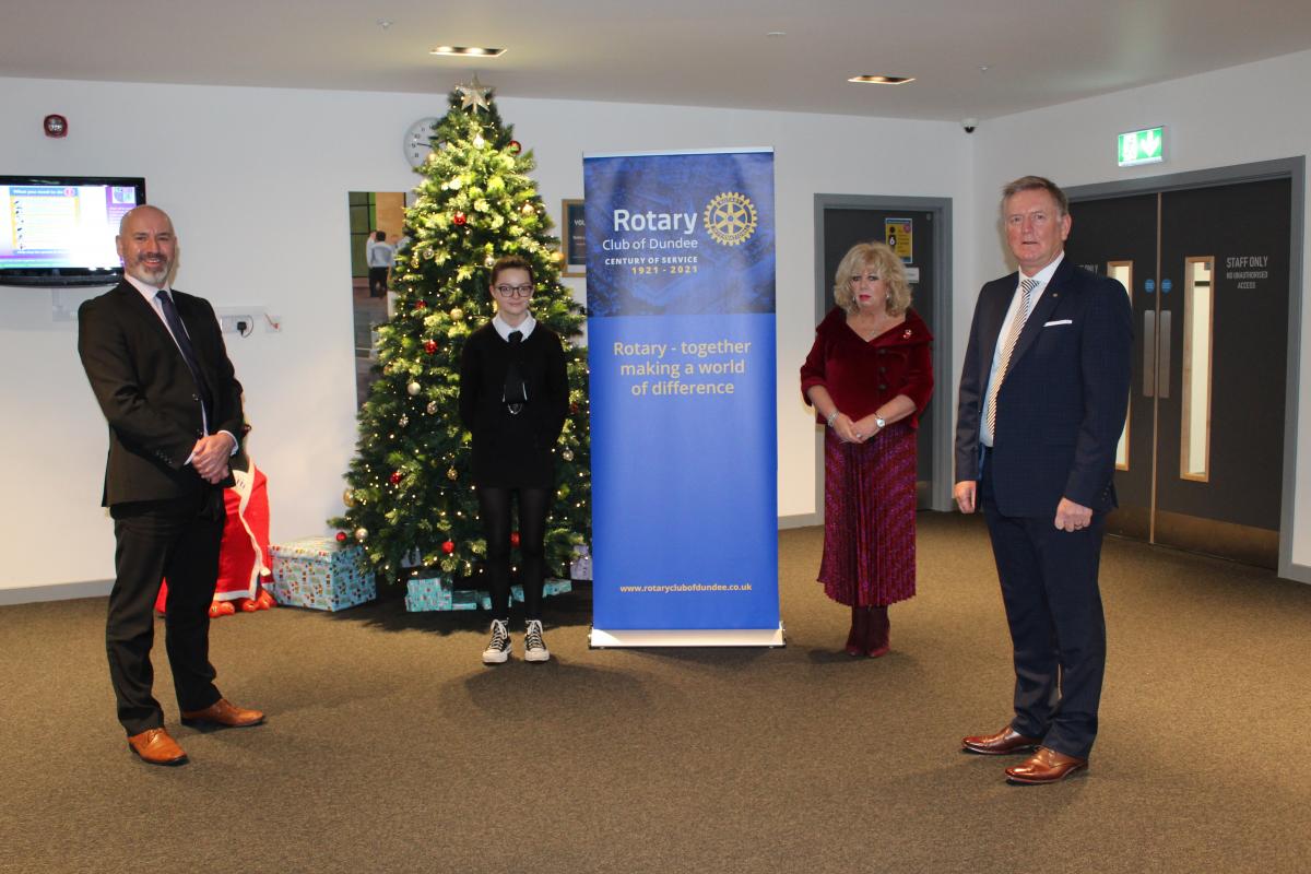 Baldragon Academy head teacher Hugh McAninch, pupil Imogen Robertson, Dundee City Chief Educational Officer Audrey May and Dundee Rotary Past President Robert Dunn