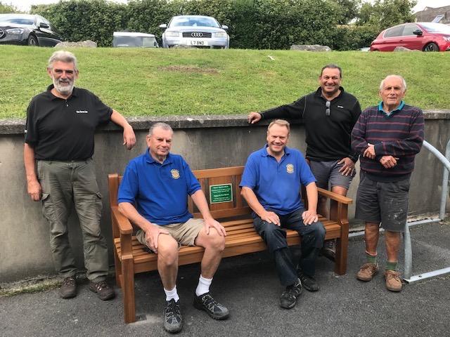 Members ‘sitting down’ after installing a Chat Bench at Saundersfoot Medical Centre.