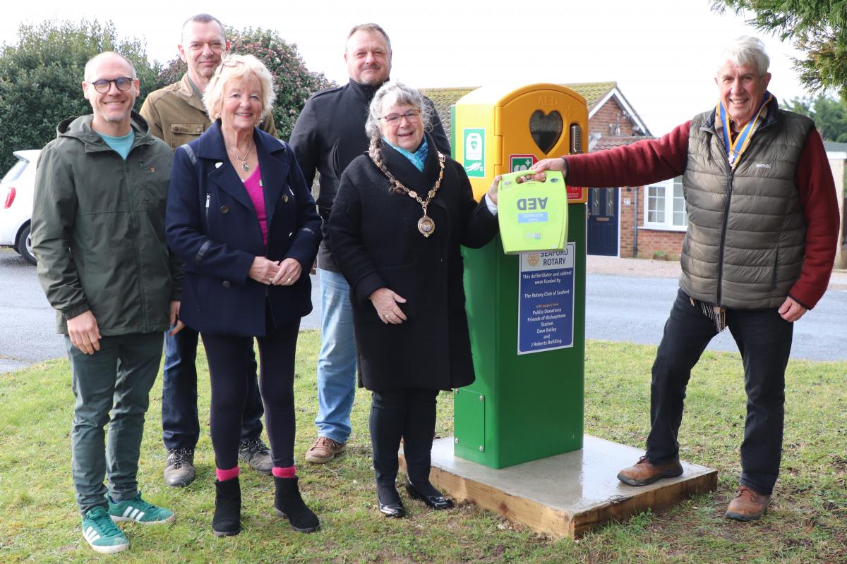 Seaford Rotary President Clive Livingstone handing over the defibrillator to Mayor of Seaford Councillor Sally Markwell with from the left David Bailey, Jim Stanford and Barbara Mine (Friends of Bishopstone Station) and Jesse Roberts 
