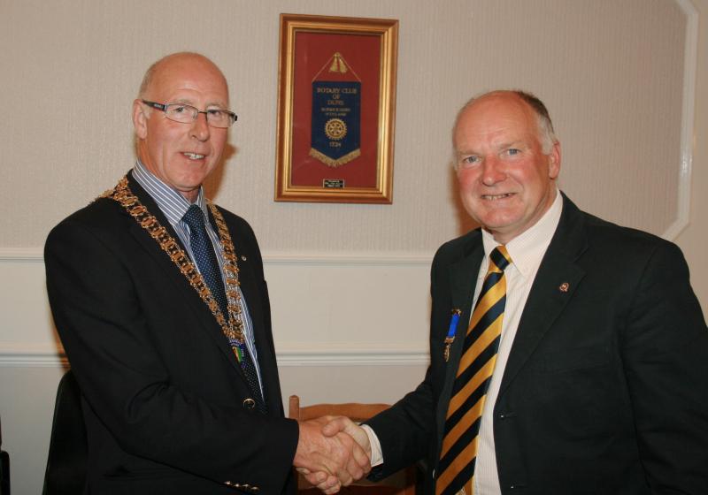 A rather tense President Eric is presented with his Chain of Office by rather relaxed Past President Bob, June 2013