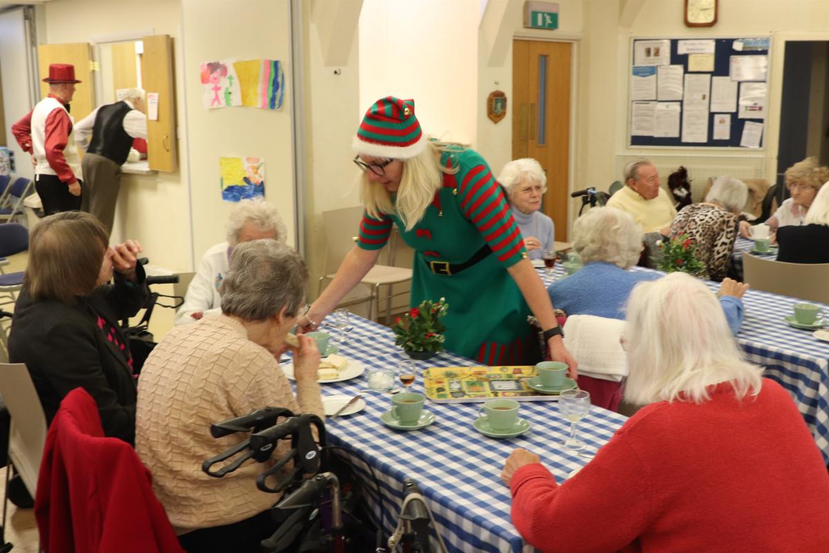 Senior Citizen's Party - Mary Hawes serving refreshments to the party guests