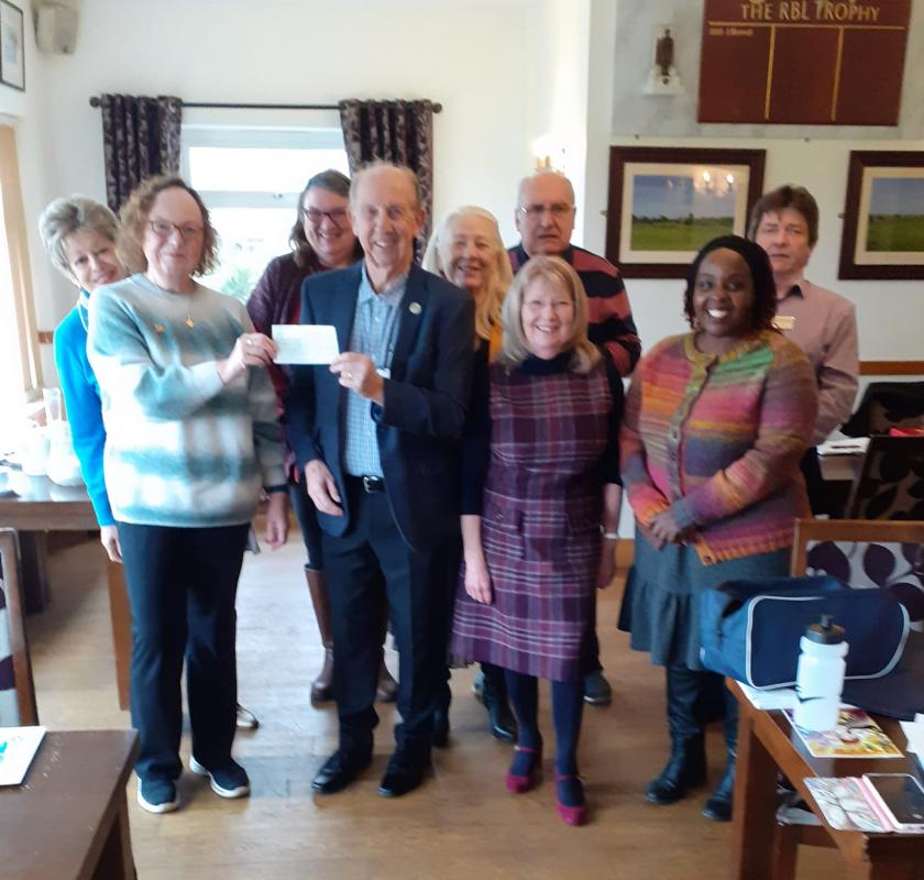 Club breakfast meeting and cheque presentation - President Caroline Winzer and club members with Gary Fagg MBE
