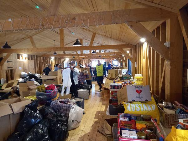 Club Members helping the Ukraine aid operation organised by the Kent Poles Union - Donated goods being sorted ready for collection and transport
