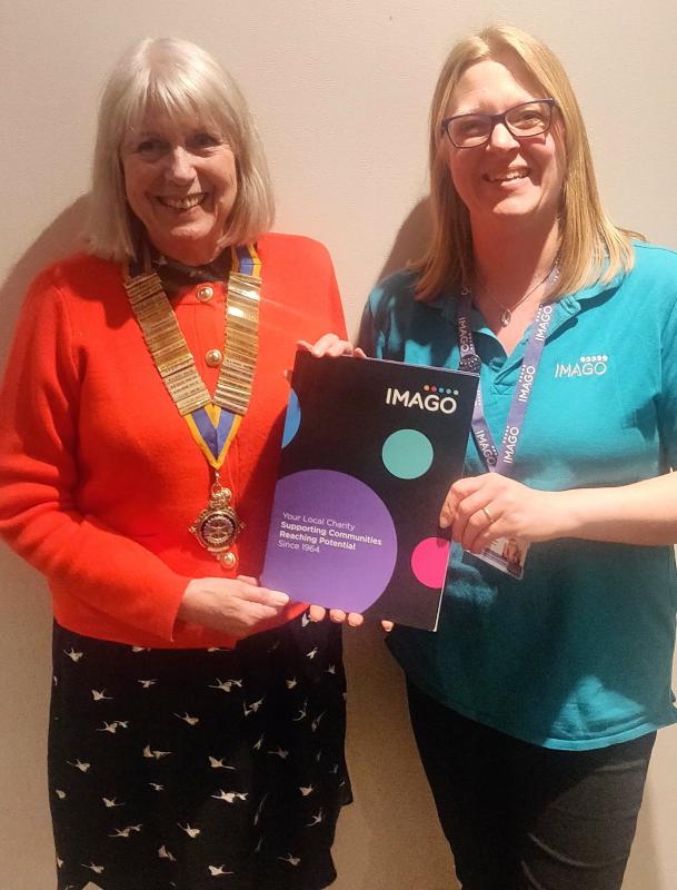 President Renate being presented with the latest Imago Brochure by Fundraising and Development manager, Fiona Cottingham